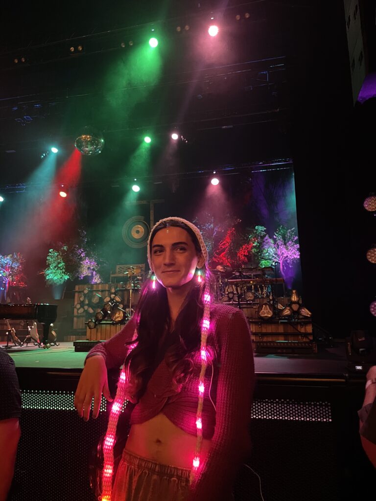 Me wearing LEDEarrings V2 at Jacob Collier's 2024 Miami concert after being inspired to make the V0 LEDEarrings for his first concert I went to years prior